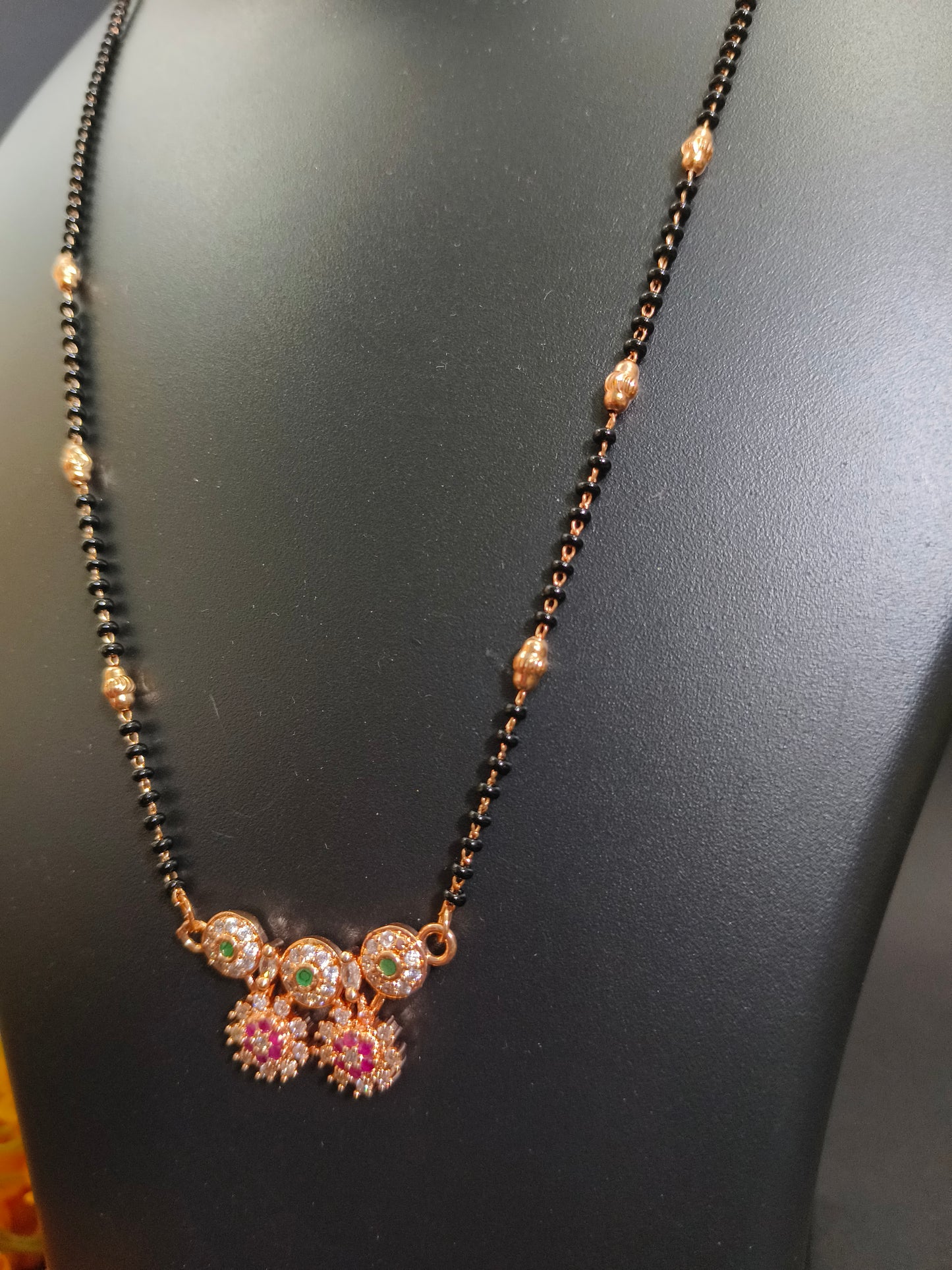 Elegant Floral Mangalsutra with Black Beads & Gold-Plated Detail