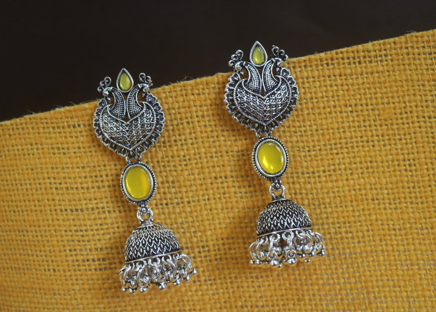 Oxidized Jhumka Earrings with Peacock Motif - Yellow