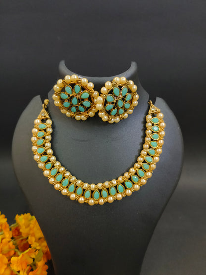 Sukkhi Ritzy Gold Plated Choker Necklace Set with Earrings & Maang Tikka