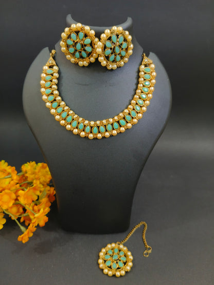 Sukkhi Ritzy Gold Plated Choker Necklace Set with Earrings & Maang Tikka