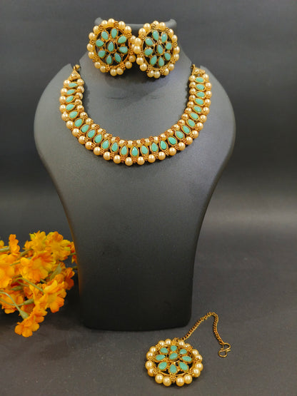 Sukkhi Ritzy Gold Plated Choker Necklace Set with Earrings & Maang Tikka